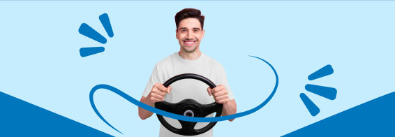 guy holding a car wheel